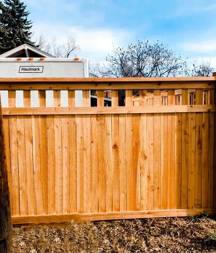 Cedar fence with decorative lattice top installed by Gray Fencing in Fort Collins, CO